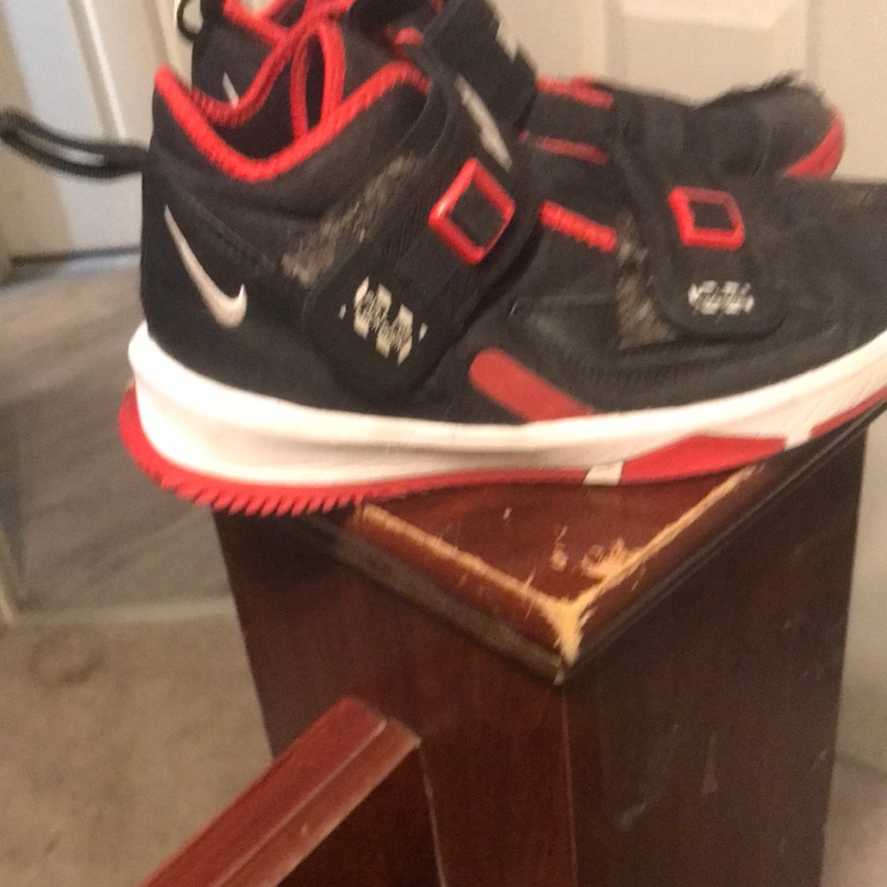 Black and white and red lebrons